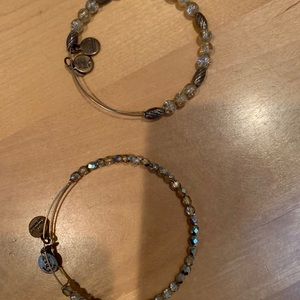 Alex and Ani (2) and one other bracelet
